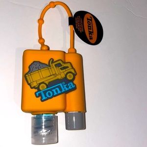 Tonka carrying case with hand sanitizer and lip balm